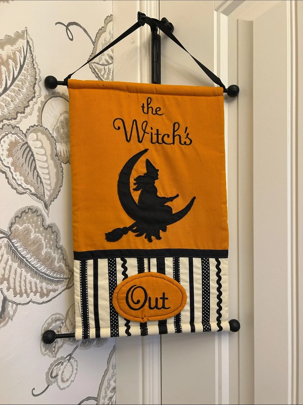 Orange & Black 'The Witch's Out' Halloween Wall Hanging